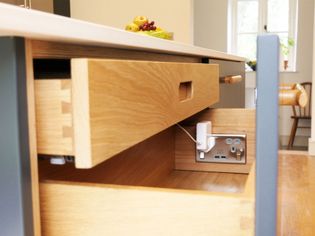 Secret drawer within a large pan drawer