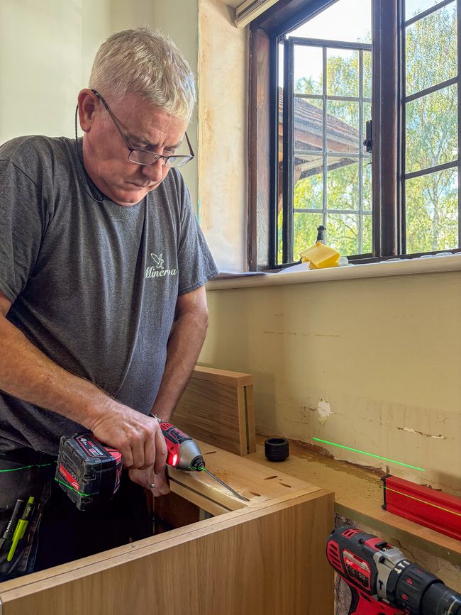 cabinet being fitted by a skilled installer