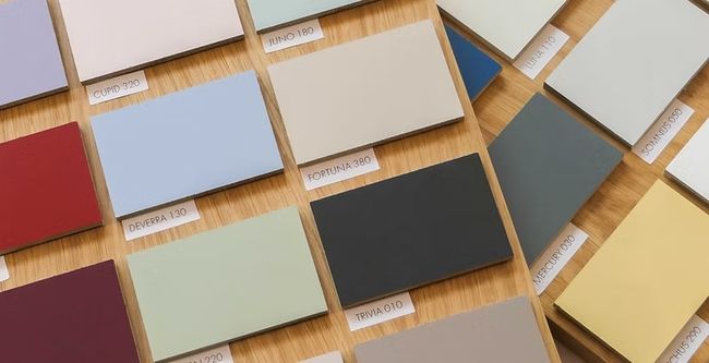 Painted kitchen colour samples on oak in sage, blue, charcoal and cream