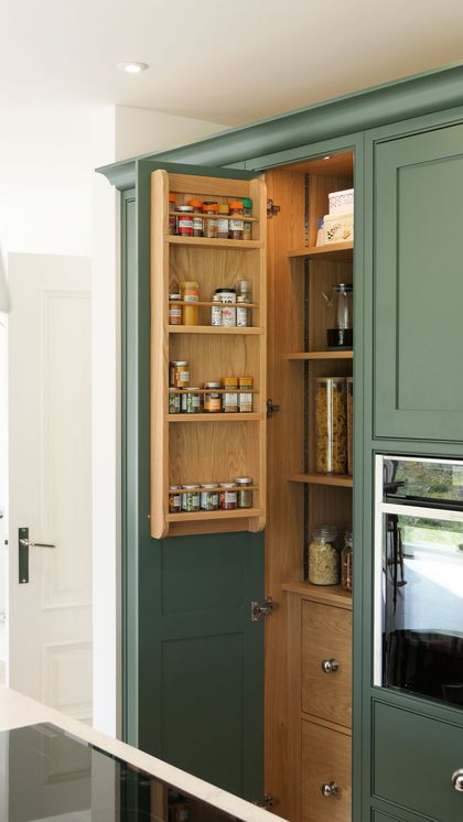 Oak spice rack on a pantry door