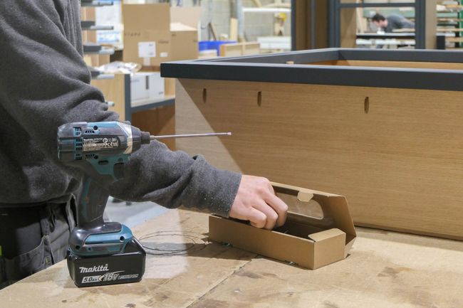 Cabinetmakers building kitchens by hand in the Minerva workshop in Herefordshire